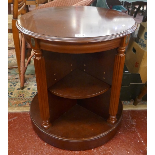 346 - Unusual mahogany revolving table with shelving to base