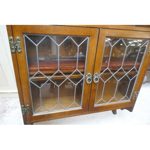 372 - Oak wall unit with leaded glass