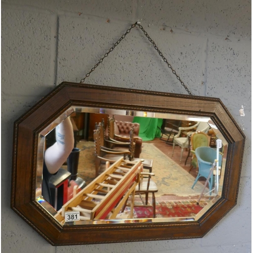 381 - Oak framed bevelled glass mirror