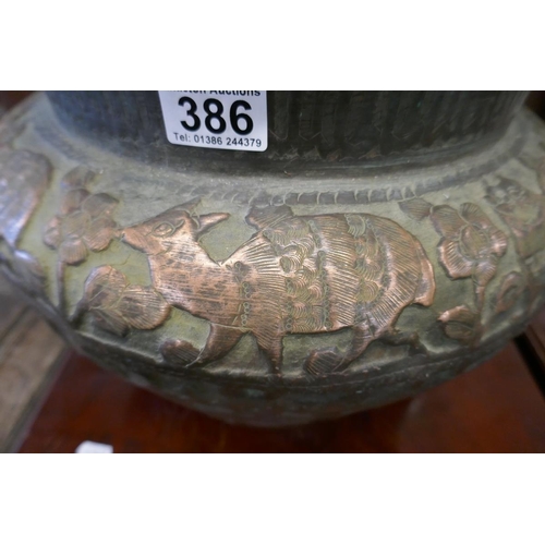 386 - Large copper planter depicting wildlife