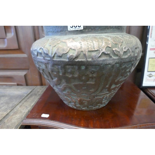 386 - Large copper planter depicting wildlife