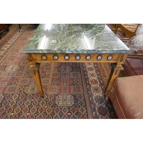 392 - Marble topped ormolu mounted coffee table - Approx size: L: 129cm W: 69cm H: 55cm