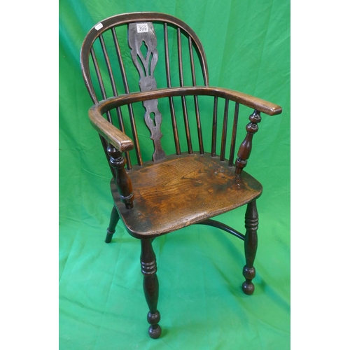 399 - Antique elm seated stick back armchair with crinoline stretcher