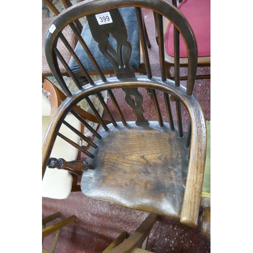 399 - Antique elm seated stick back armchair with crinoline stretcher