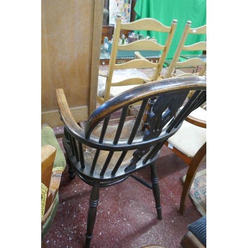 399 - Antique elm seated stick back armchair with crinoline stretcher