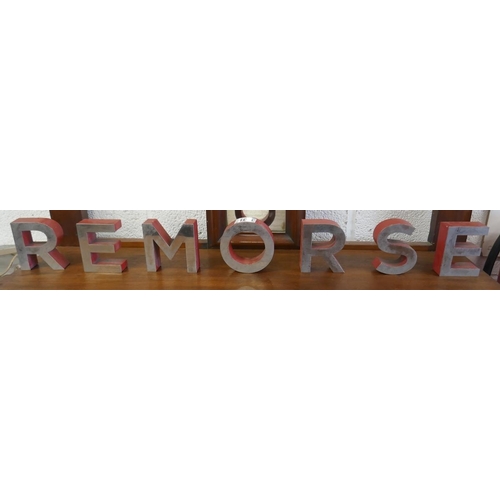 406 - Metal letters spelling REMORSE - Approx H: 10cm