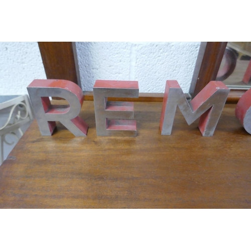 406 - Metal letters spelling REMORSE - Approx H: 10cm