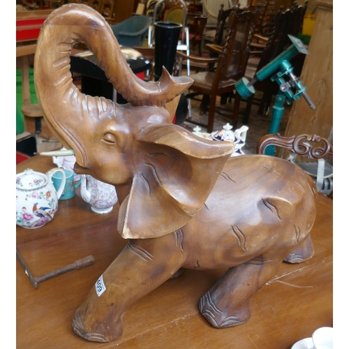 409 - Large hardwood carved elephant with glass tucks - Approx H: 62cm