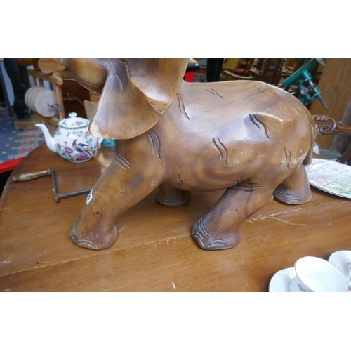 409 - Large hardwood carved elephant with glass tucks - Approx H: 62cm