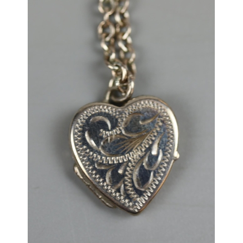 49 - Silver locket on chain & silver ring