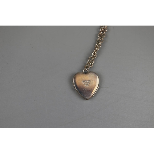 49 - Silver locket on chain & silver ring