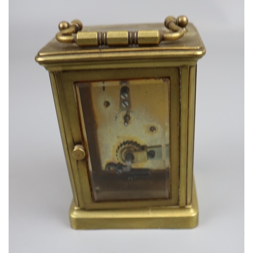 67 - Working carriage clock with bevelled glass & key