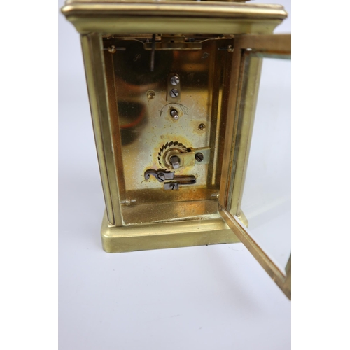 67 - Working carriage clock with bevelled glass & key