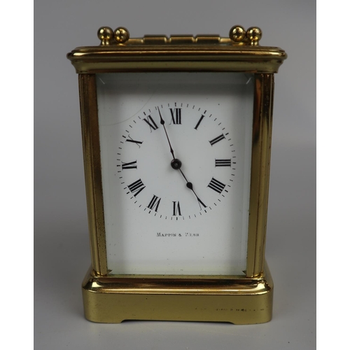 69 - Small working carriage clock by Mappin & Webb with key