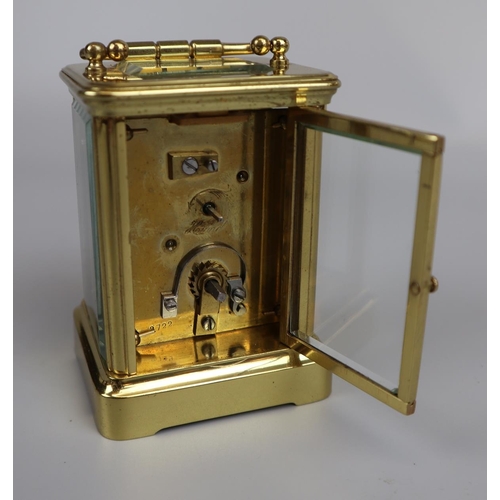 69 - Small working carriage clock by Mappin & Webb with key