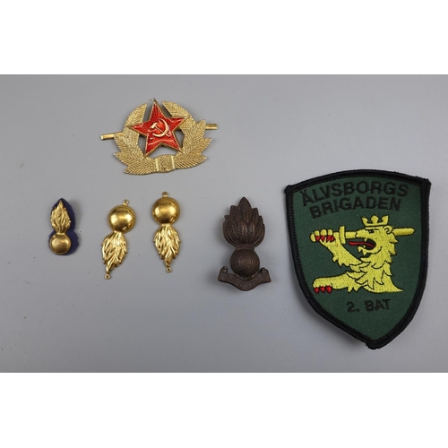 75 - Collectables to include postcards, militaria, medallions etc