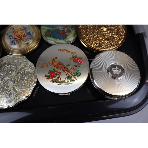 107 - Large collection of compacts