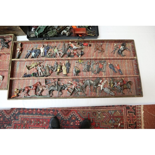 113 - Very large cased collection of lead soldiers etc to include early hollow lead examples