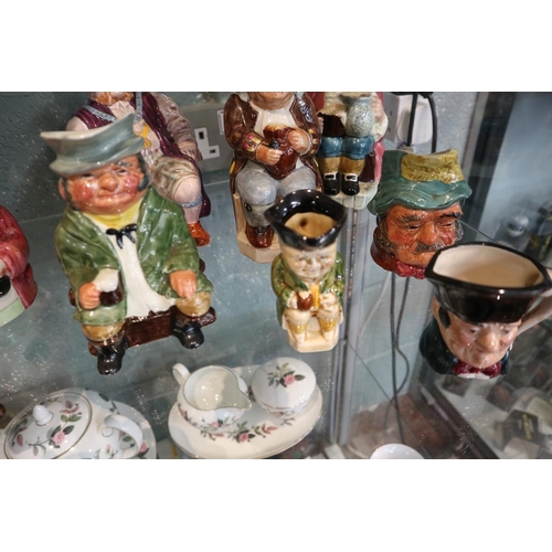 140 - Collection of Toby jugs etc