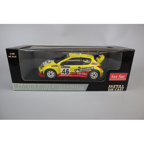 149 - Sunstar 1:18 scale model Peugeot 206 WRC car - Valentino Rossi/C Cassina