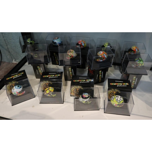 155 - Collection of 13 Minichamps 1:8 scale model AVG Valentino Rossi helmets