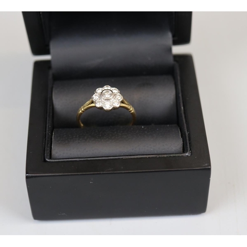 16 - 18ct gold diamond set daisy ring (size P½)