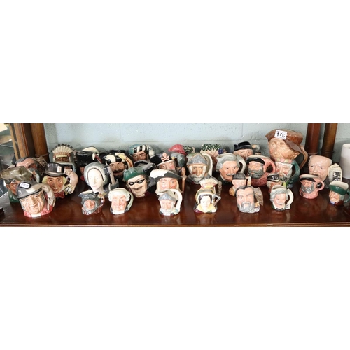 176 - Large collection of Royal Worcester Toby jugs