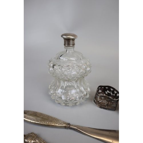 2 - Collection of hallmarked silver to include silver topped perfume bottle