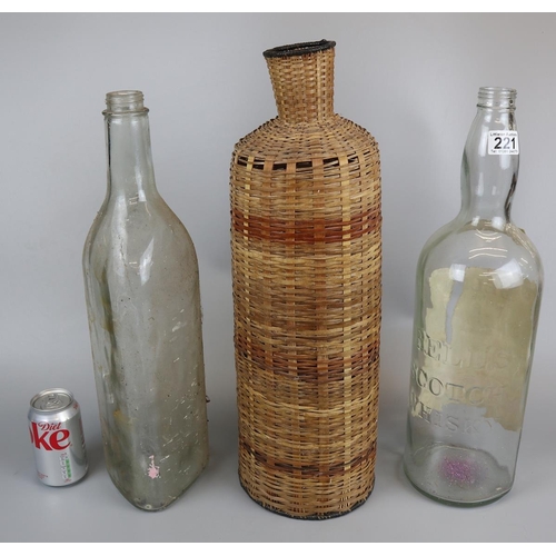 221 - 2 large whisky bottles to include wicker cover