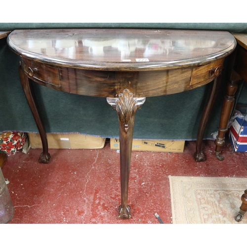 222 - Mahogany demi lune hall table on ball and claw feet