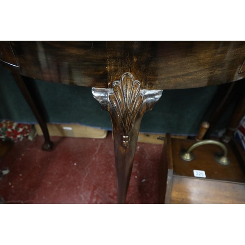 222 - Mahogany demi lune hall table on ball and claw feet