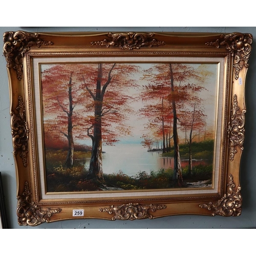 259 - Oil on canvas - Lake scene in ornate gilt frame