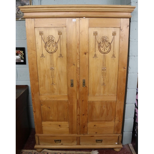 288 - Pine wardrobe with carved panels - Approx size W: 130cm D: 57cm H: 195cm