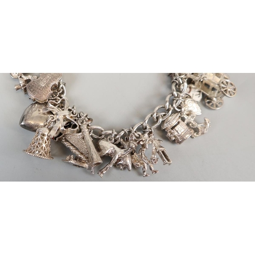 32 - Silver charm bracelet