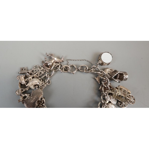 32 - Silver charm bracelet