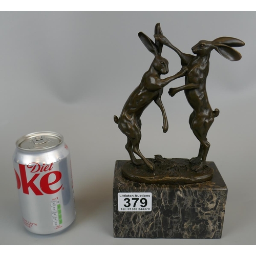 379 - Bronze on marble base, boxing hares