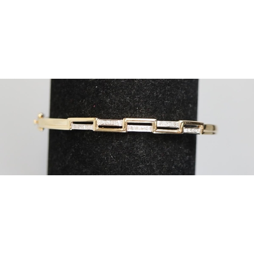 39 - Gold diamond set bangle