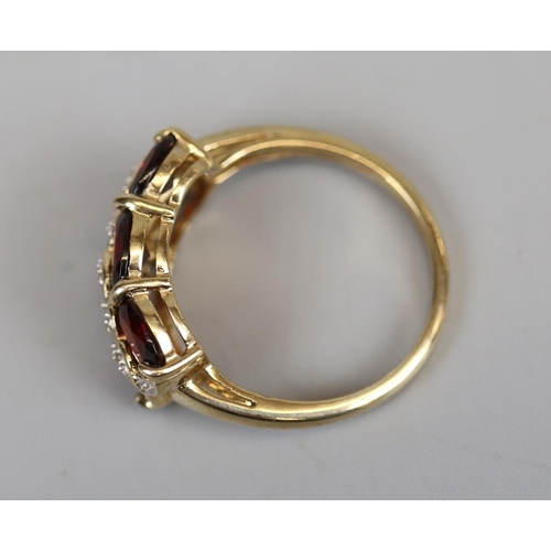 48 - Gold garnet & diamond set ring (size M½)