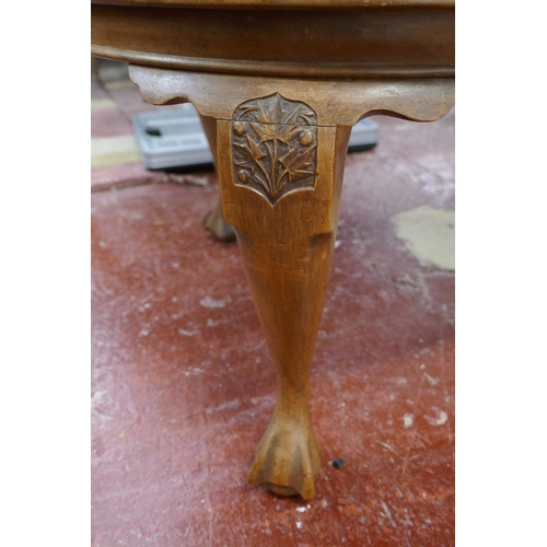 492 - Carved mahogany coffee table on ball & claw feet