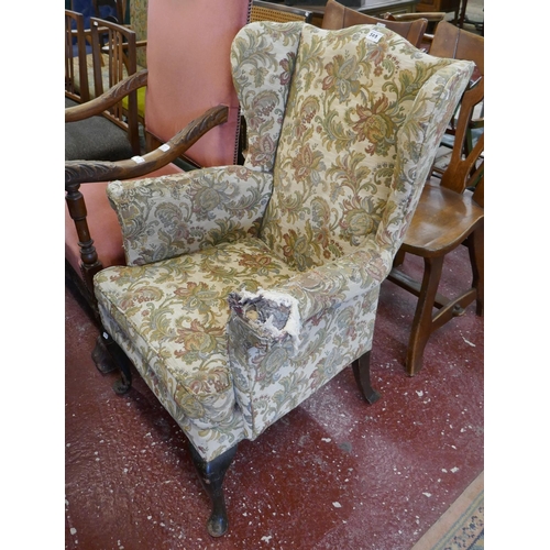 505 - Floral pattern wing back armchair A/F