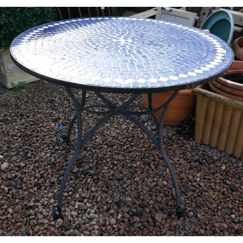 535 - Round tile top garden table