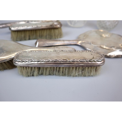 6 - Collection of hallmarked silver dressing table brushes, bottles etc