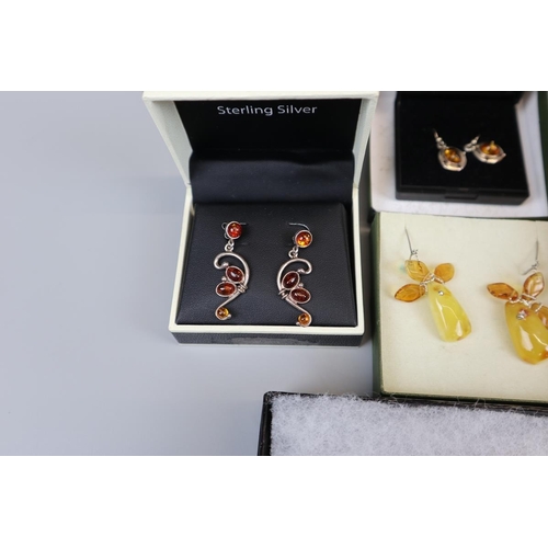 65 - Collection of amber set jewellery to include silver