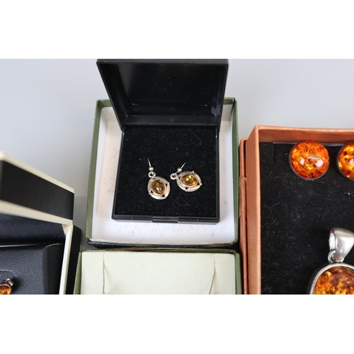 65 - Collection of amber set jewellery to include silver