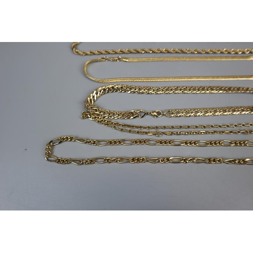 83 - Collection of gold tone necklaces