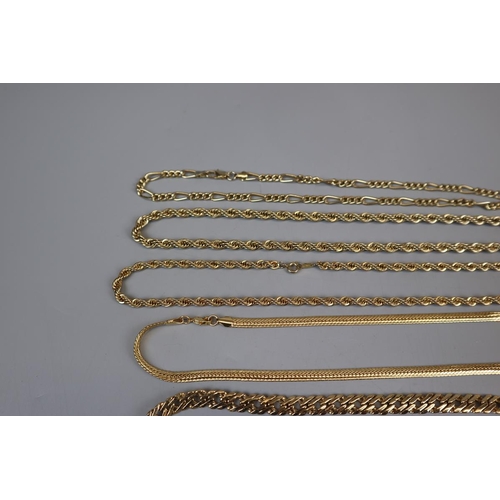 83 - Collection of gold tone necklaces