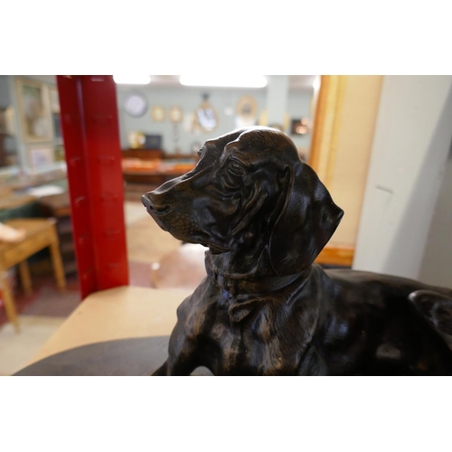 167 - Bronzed dog figure on wooden plinth - Approx. L: 42cm