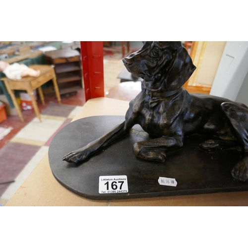 167 - Bronzed dog figure on wooden plinth - Approx. L: 42cm