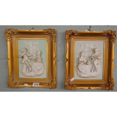 234 - Pair of bisque plaques in gilt frames