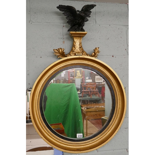 239 - Round gilt framed mirror adorned with eagle